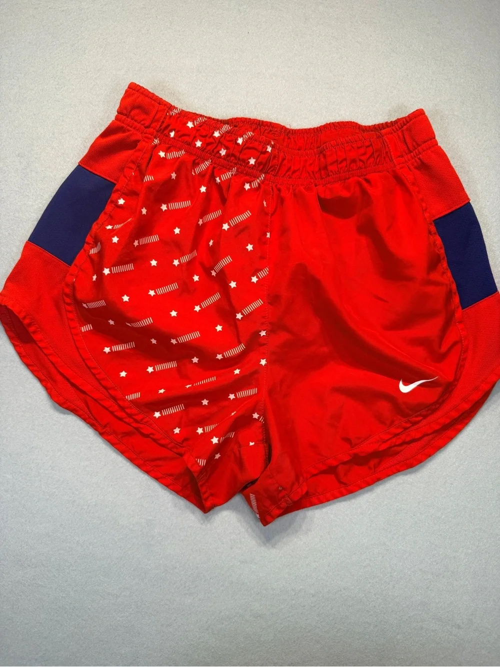 Nike Women's Red Athletic Shorts with Navy Panels and Star Print size S